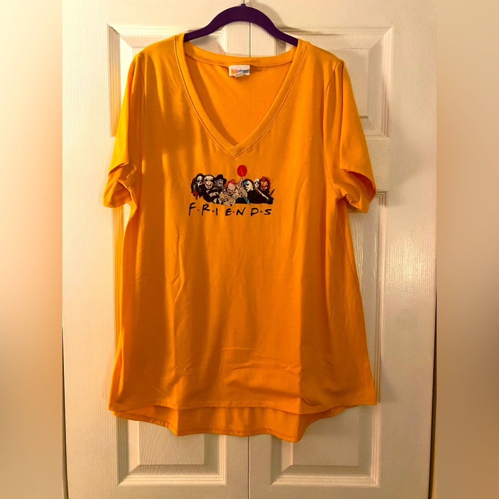💛👻NWOT! Lularoe Women’s Yellow Horror Icons Short Sleeve Tee Shirt👻💛